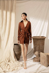 Silk shirt dress with tie-front draping and collared neckline for contemporary elegance